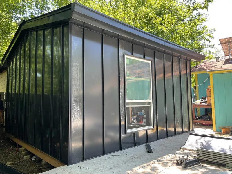 Black standing seam metal wall panels for Roof Inspection in Mesa